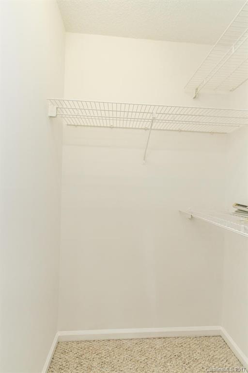 301 Queens Road, Unit 201 Charlotte, NC 28204 - Photo 18 of 24 a view of small space with racks on the wall