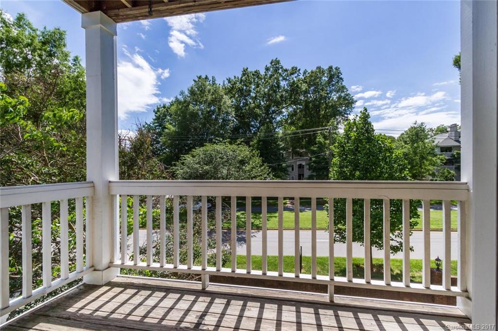 301 Queens Road, Unit 201 Charlotte, NC 28204 - Photo 21 of 24 a view of a two chairs in the balcony