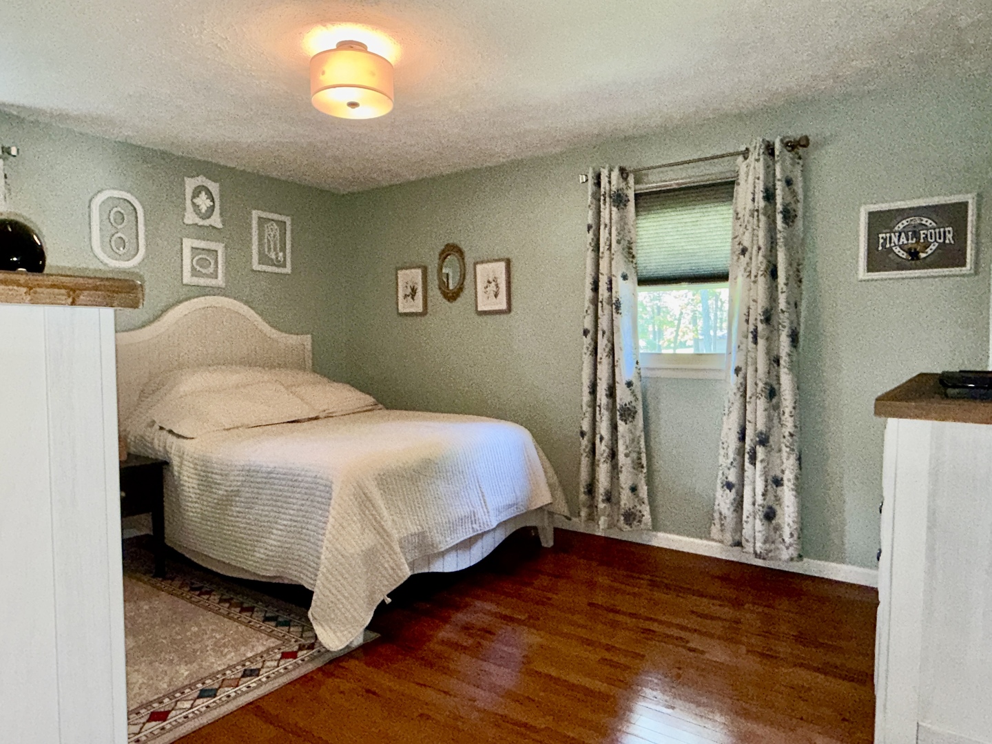 956 Country Club Road Metropolis, IL 62960 - Photo 14 of 48 a bedroom with a bed and wooden floor