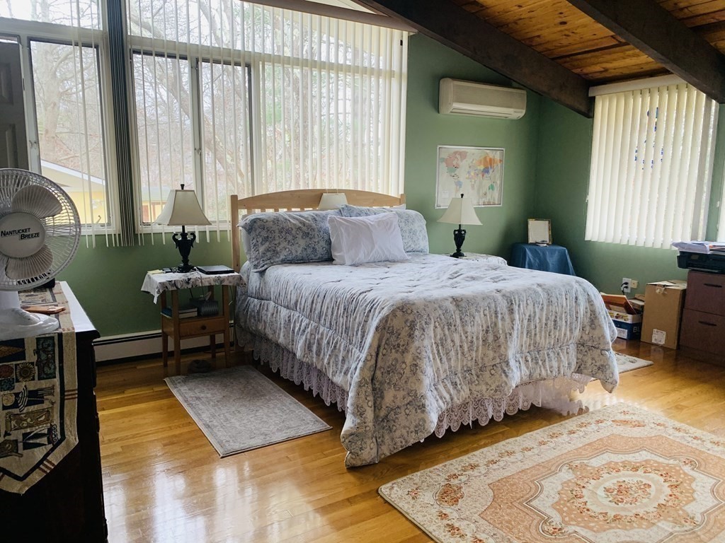 10 Bunker Circle Sandwich, MA 02563 - Photo 11 of 19 a bedroom with a bed chair and a window