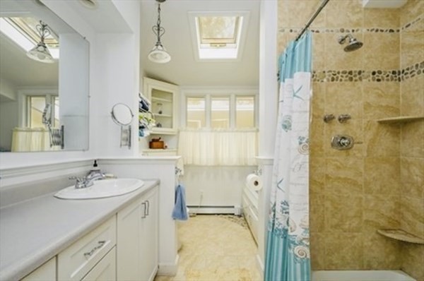 10 Bunker Circle Sandwich, MA 02563 - Photo 13 of 19 a bathroom with a sink and a mirror