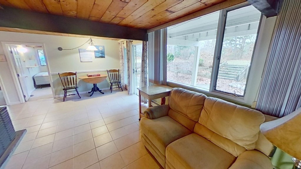 10 Bunker Circle Sandwich, MA 02563 - Photo 14 of 19 a living room with furniture and a large window