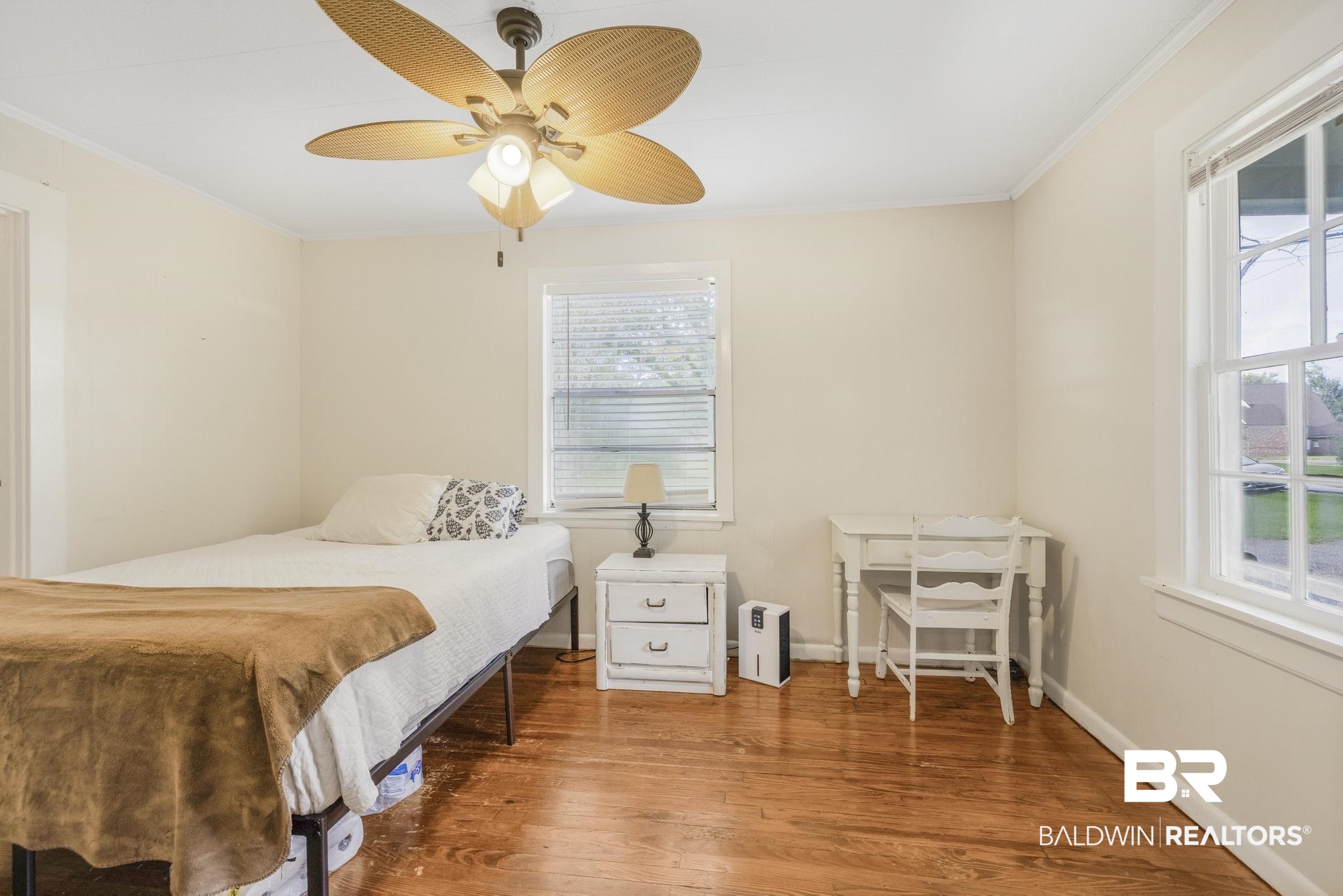 405 North Pine Street Foley, AL 36535 - Photo 25 of 33 Bedroom featuring wood finished floors, crown molding, and a ceiling fan