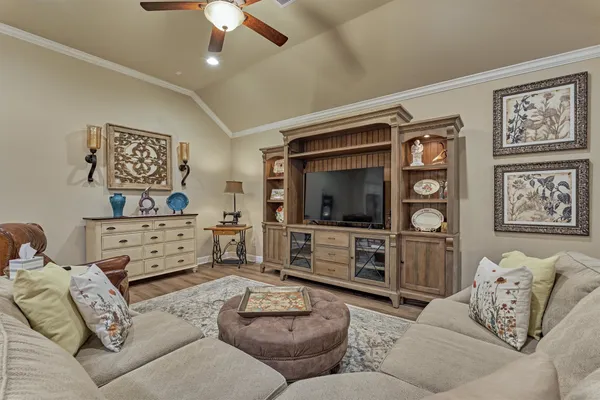 a living room with furniture and a window
