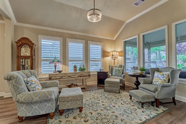 a kitchen with stainless steel appliances granite countertop a stove refrigerator and cabinets