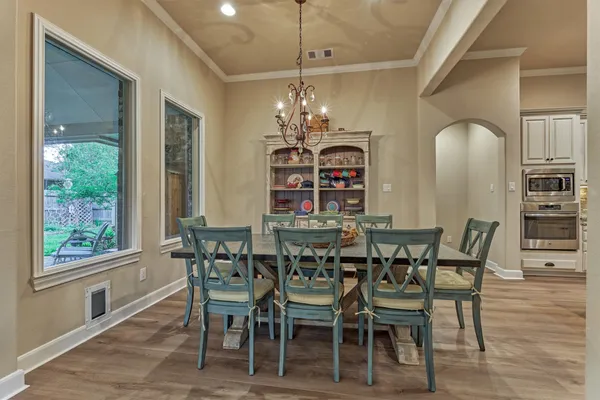 a kitchen with a counter space cabinets and stainless steel appliances