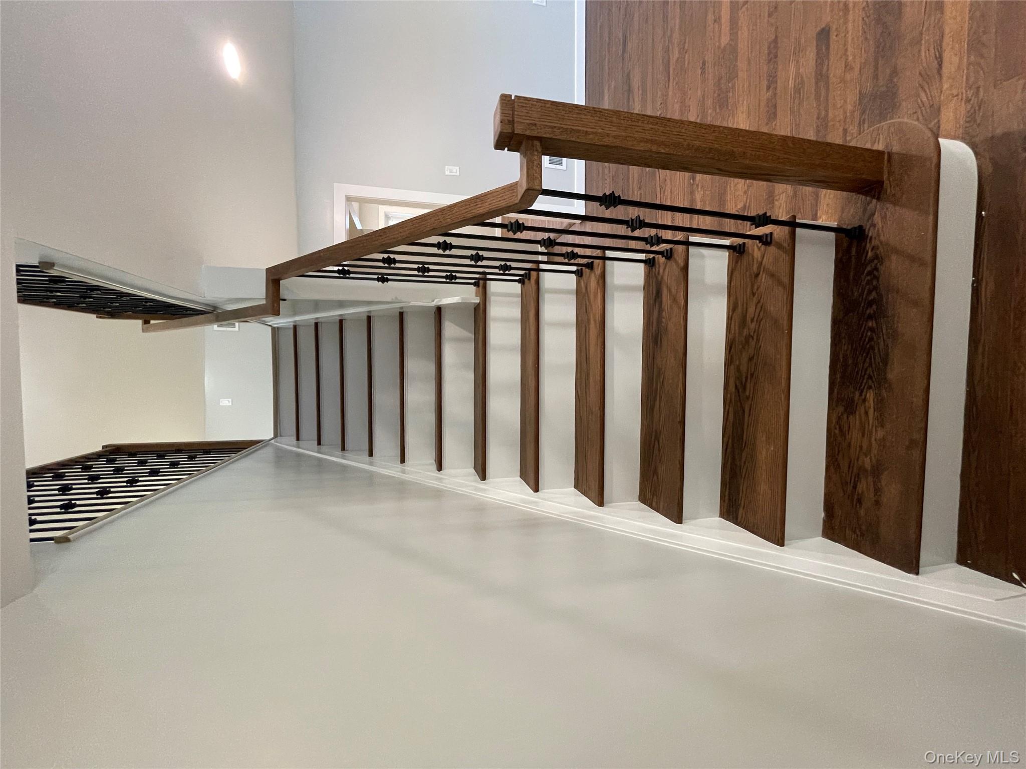 21 Janet Place Stony Point, NY 10980 - Photo 25 of 38 Stairs featuring wood finished floors and baseboards