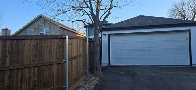a aerial view of a house with a yard