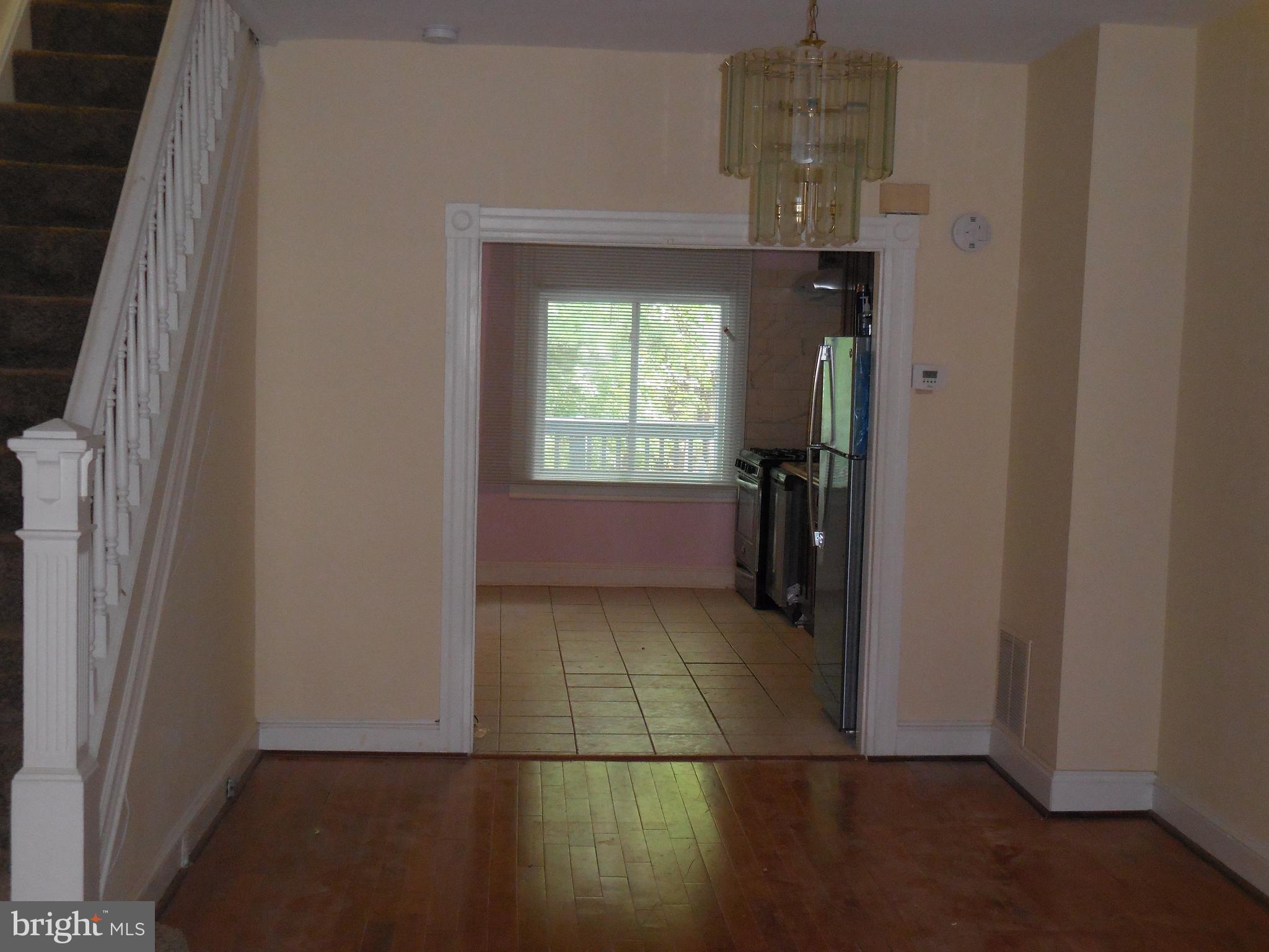 603 East 36th Street Baltimore, MD 21218 - Photo 3 of 29 a view of hallway with window