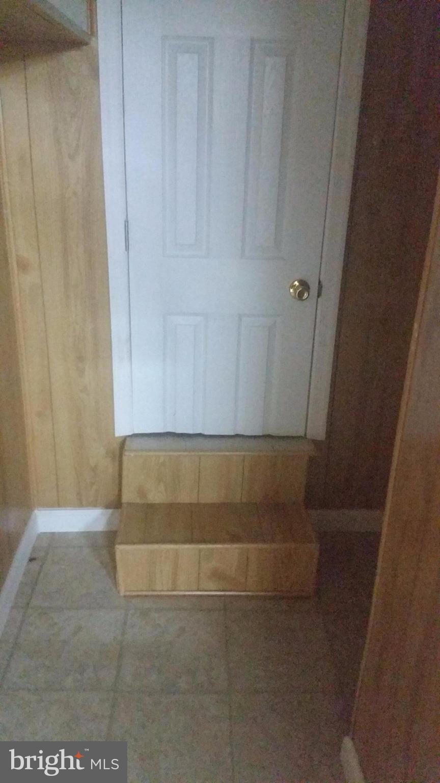 603 East 36th Street Baltimore, MD 21218 - Photo 21 of 29 a view of wooden door