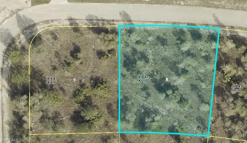 310 Jourferie Road Lehigh Acres, FL 33974 - Photo 3 of 4 a bathroom with a shower