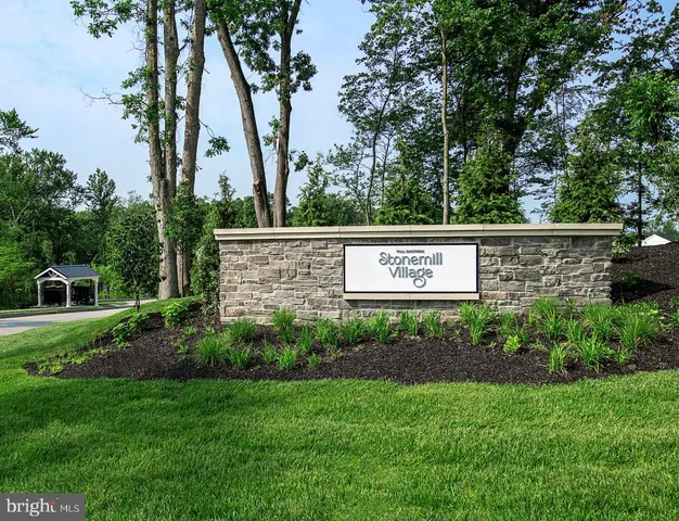 a view of outdoor space with garden and trees