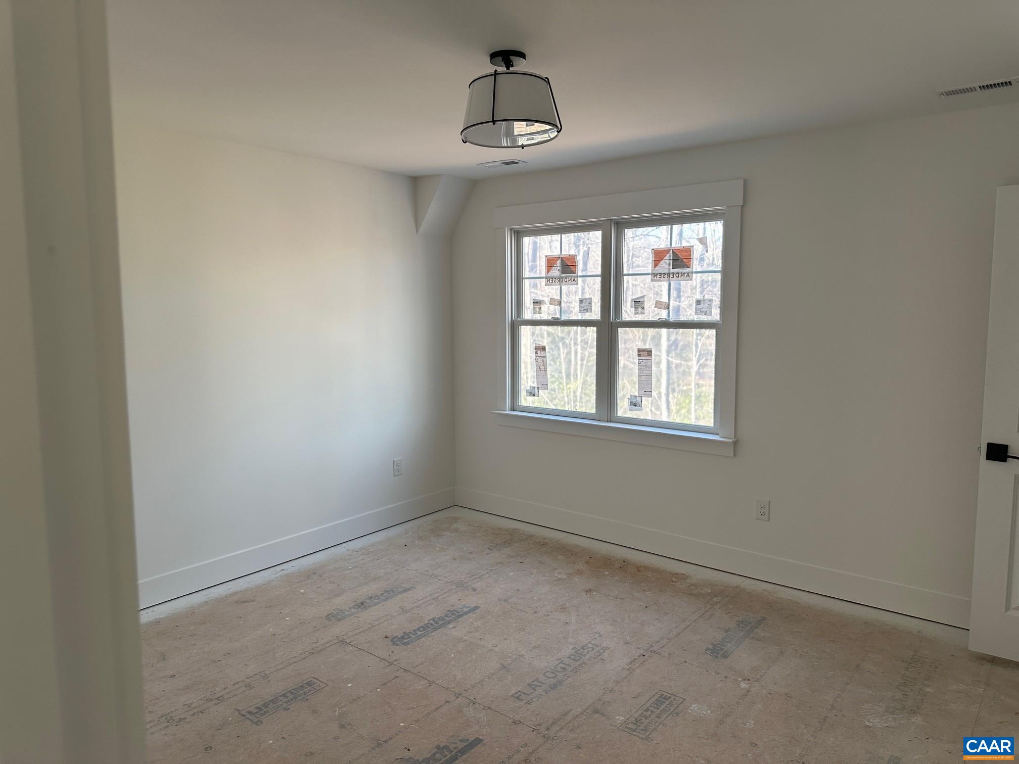 3662 West Rocketts Rdg Court Goochland, VA 23063 - Photo 2 of 20 an empty room with a window