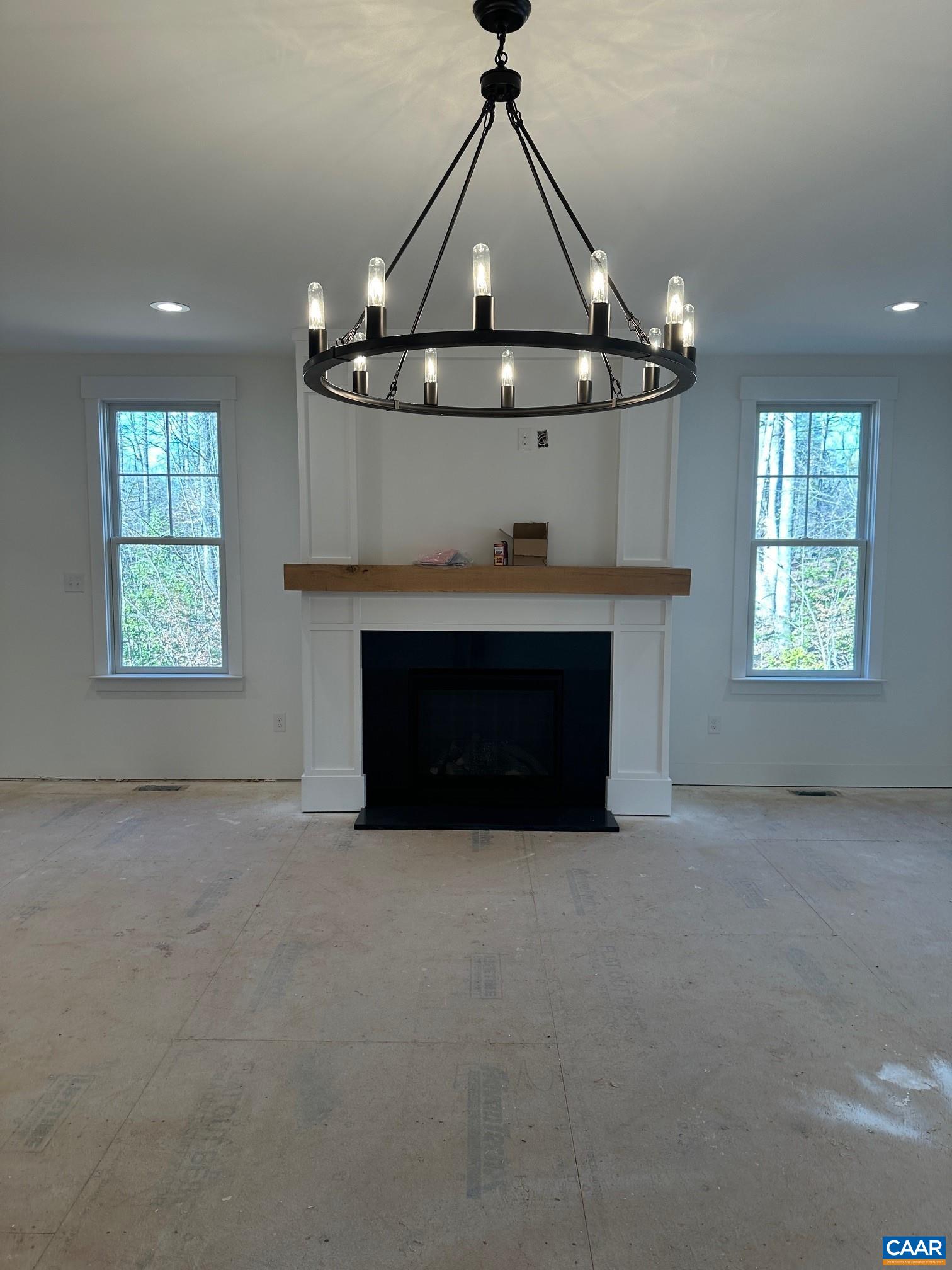 3662 West Rocketts Rdg Court Goochland, VA 23063 - Photo 4 of 20 an empty room with windows and fireplace