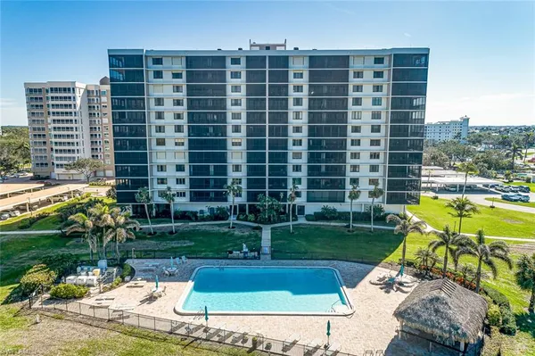 a view of a swimming pool with a patio