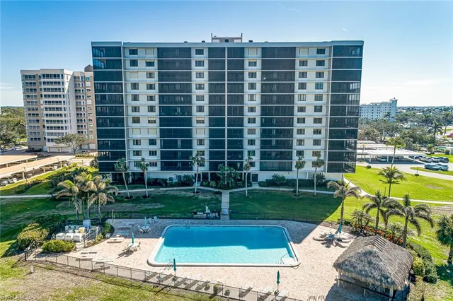 a view of a swimming pool with a patio