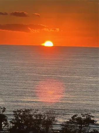 a view of ocean with beach