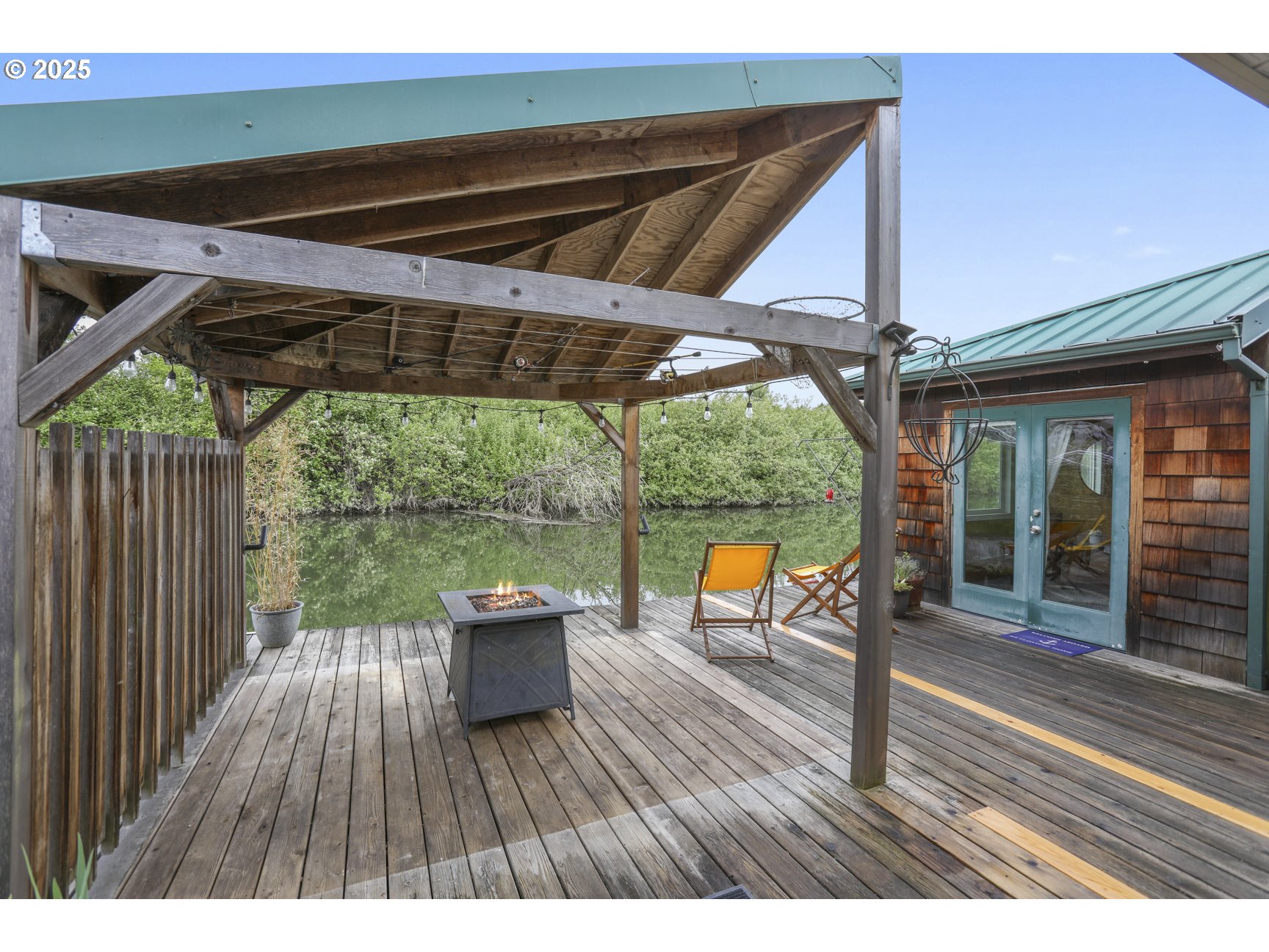 50776 Dike Road, Unit 4 Scappoose, OR 97056 - Photo 22 of 37 a terrace view with sitting space and outdoor seating