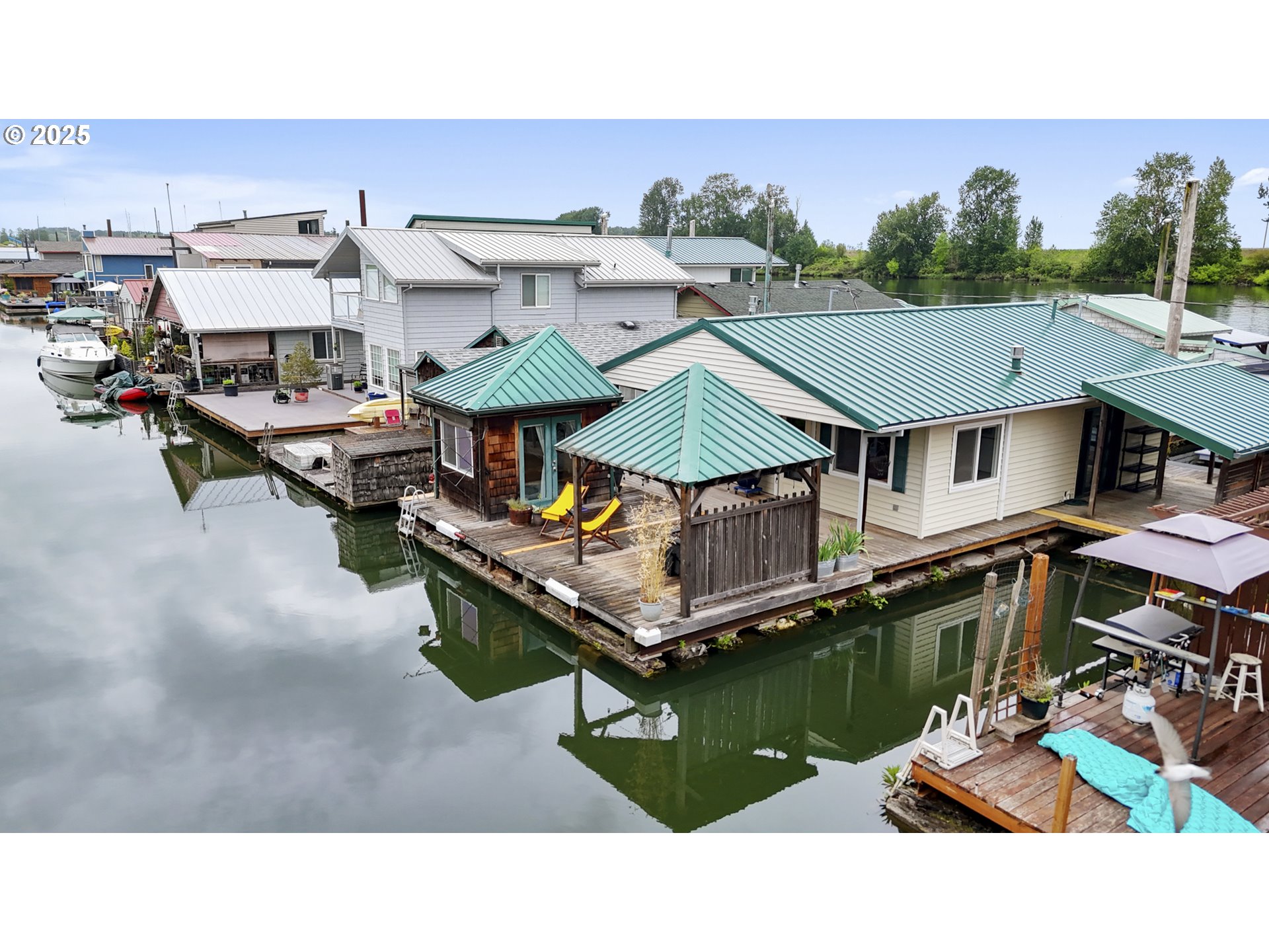 50776 Dike Road, Unit 4 Scappoose, OR 97056 - Photo 30 of 37 a terrace of a house with outdoor seating