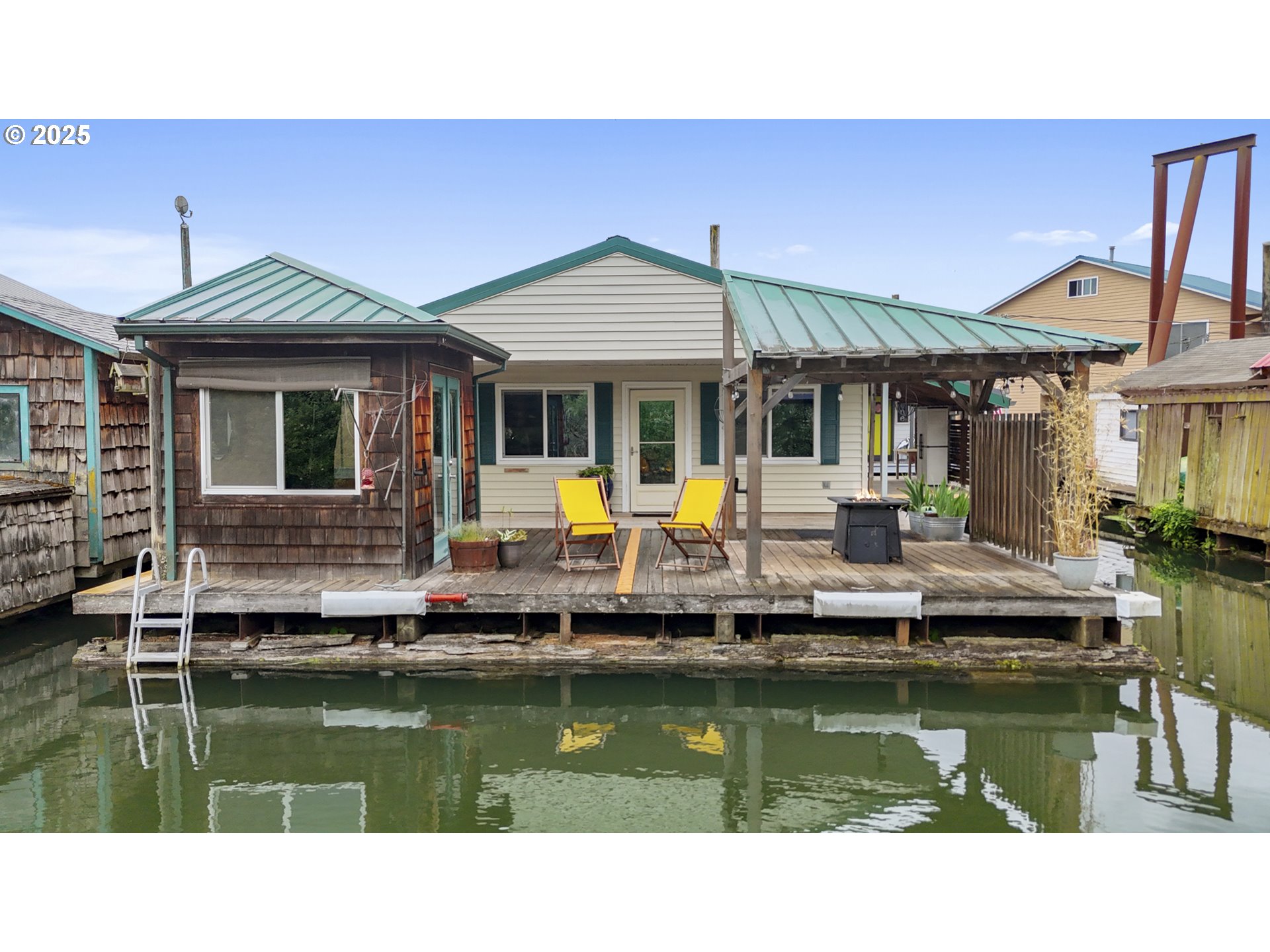 50776 Dike Road, Unit 4 Scappoose, OR 97056 - Photo 32 of 37 a swimming pool view with a outdoor seating space