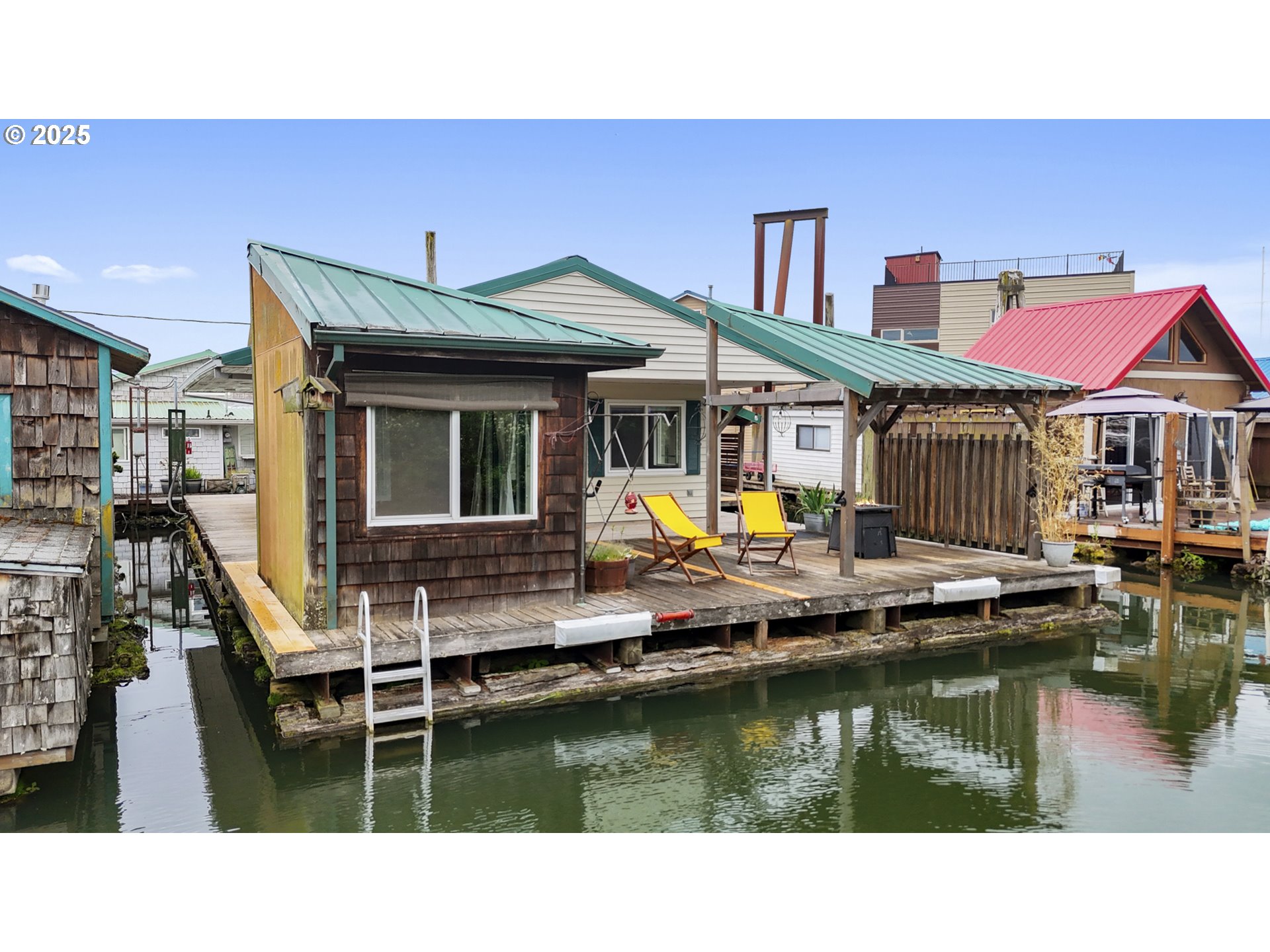 50776 Dike Road, Unit 4 Scappoose, OR 97056 - Photo 33 of 37 a aerial view of a house with swimming pool and a patio