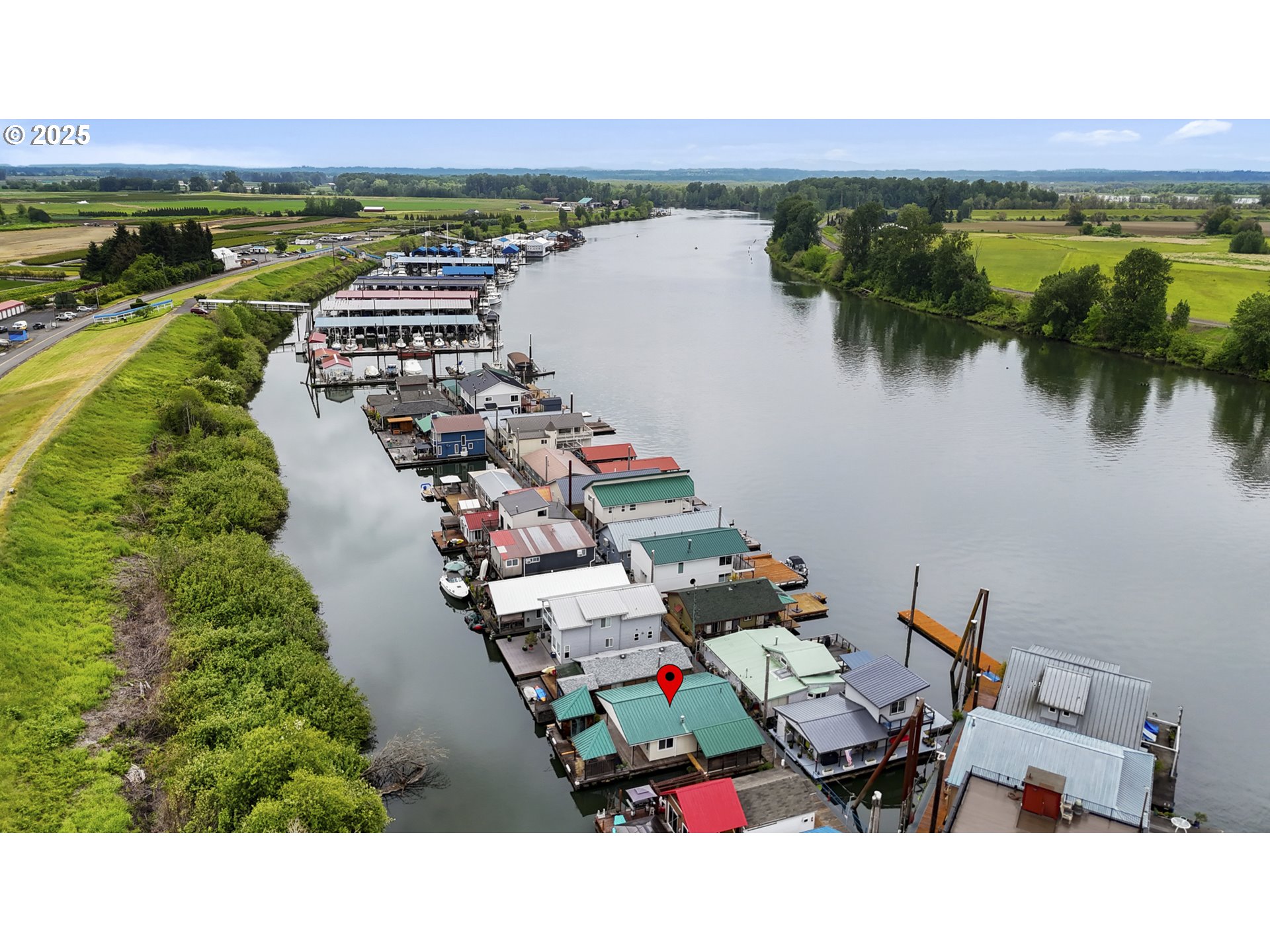 50776 Dike Road, Unit 4 Scappoose, OR 97056 - Photo 34 of 37 a view of a lake with a outdoor space