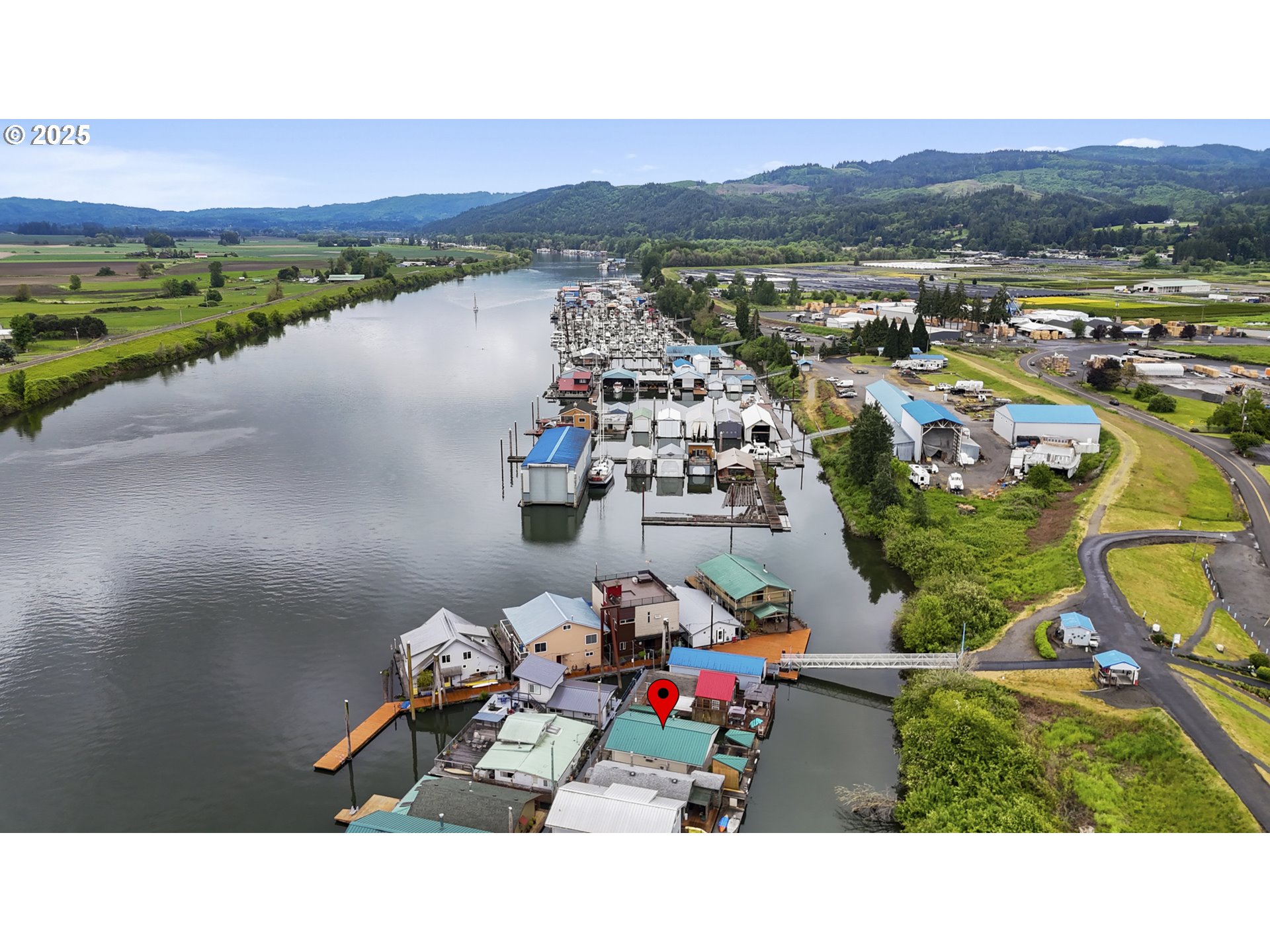 50776 Dike Road, Unit 4 Scappoose, OR 97056 - Photo 36 of 37 a picture of a room with a lot of trees in front of it