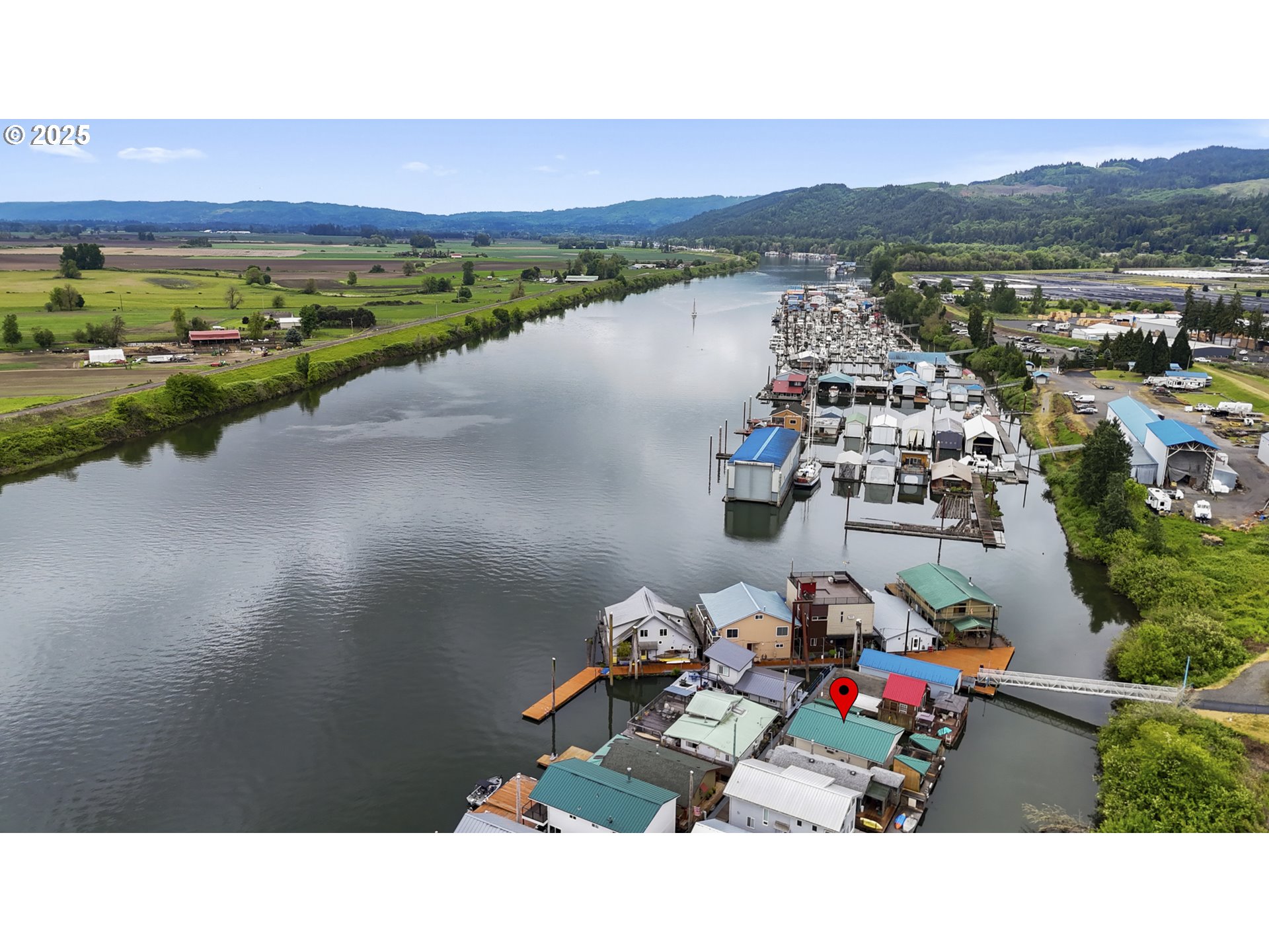 50776 Dike Road, Unit 4 Scappoose, OR 97056 - Photo 37 of 37 a view of a terrace with a table and chairs