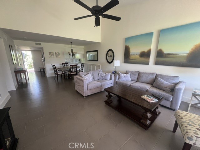 36 El Toro Drive Rancho Mirage, CA 92270 - Photo 24 of 25 a living room with furniture and wooden floor