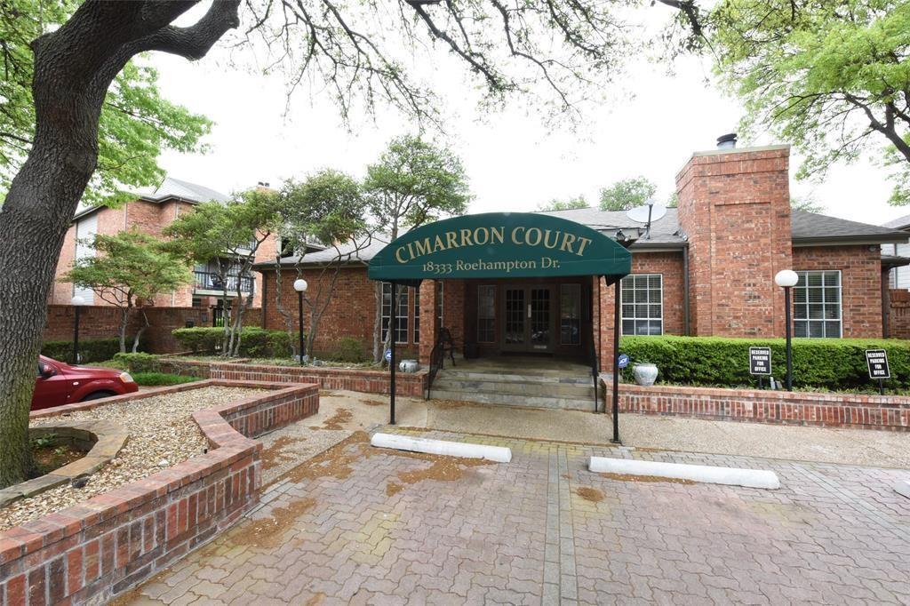 18333 Roehampton Drive, Unit 928 Dallas, TX 75252 - Photo 18 of 20 a front view of a house with garden