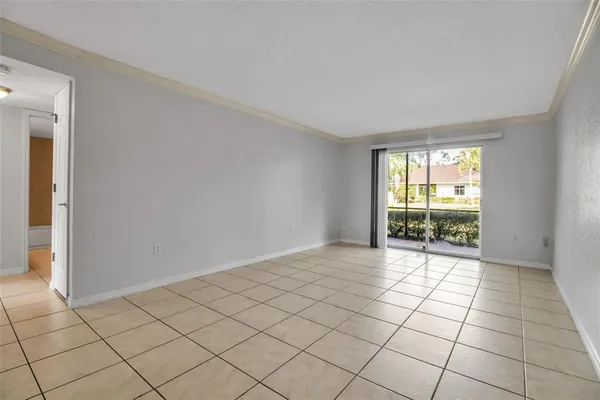 a view of an empty room and window