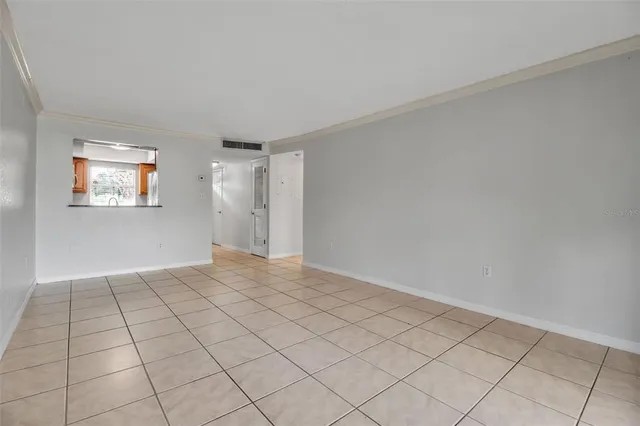 a view of an empty room and window