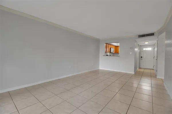 a view of an empty room and window