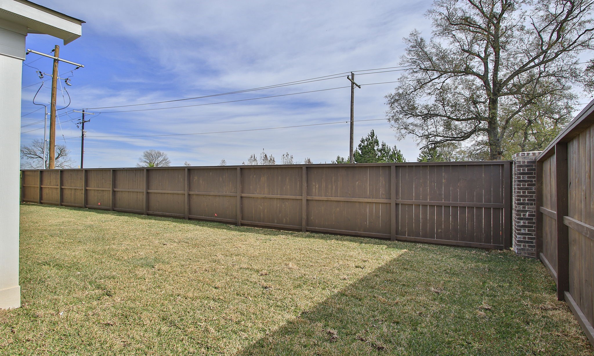 14010 Longstreet Road Willis, TX 77318 - Photo 7 of 32 a view of a backyard