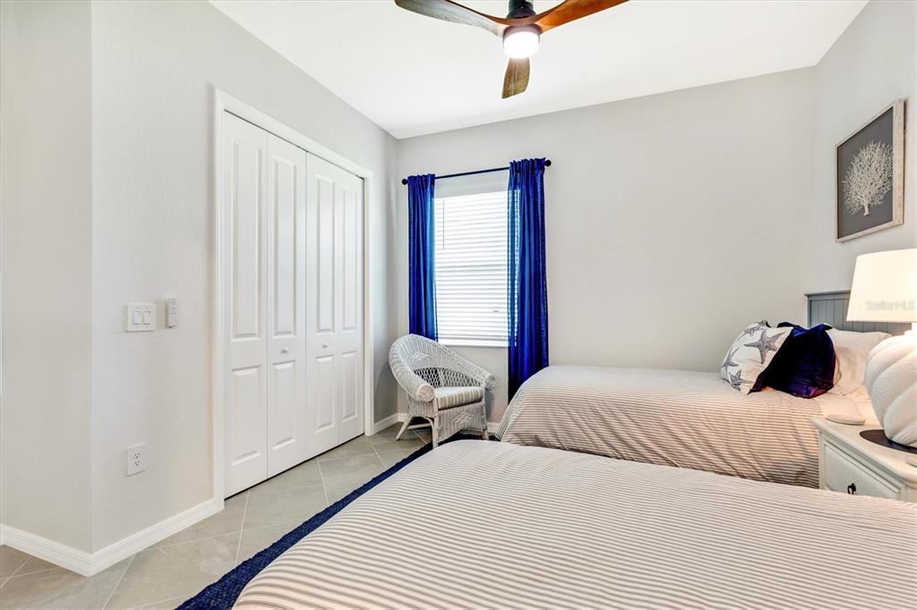 12736 Tulum Loop Venice, FL 34293 - Photo 40 of 93 a bedroom with a bed and a window