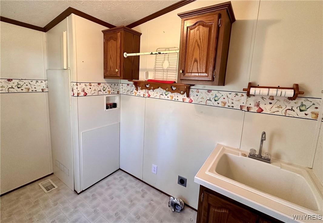 52 Calla Way Cheektowaga, NY 14043 - Photo 15 of 21 1st Floor Laundry