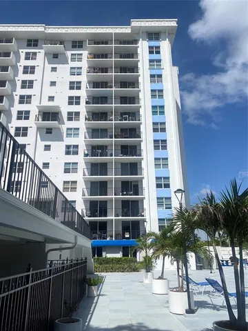 a view of a building with a street