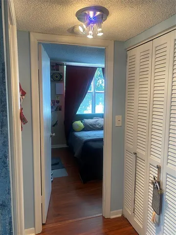 a en suite bathroom with a sink and a mirror