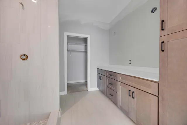 a view of a kitchen with cabinets