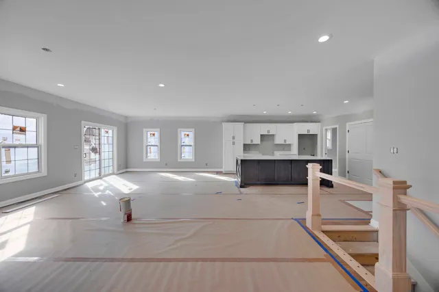 a view of kitchen with furniture and window