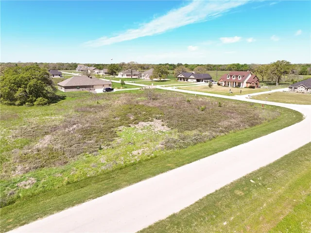 a view of an ocean and city
