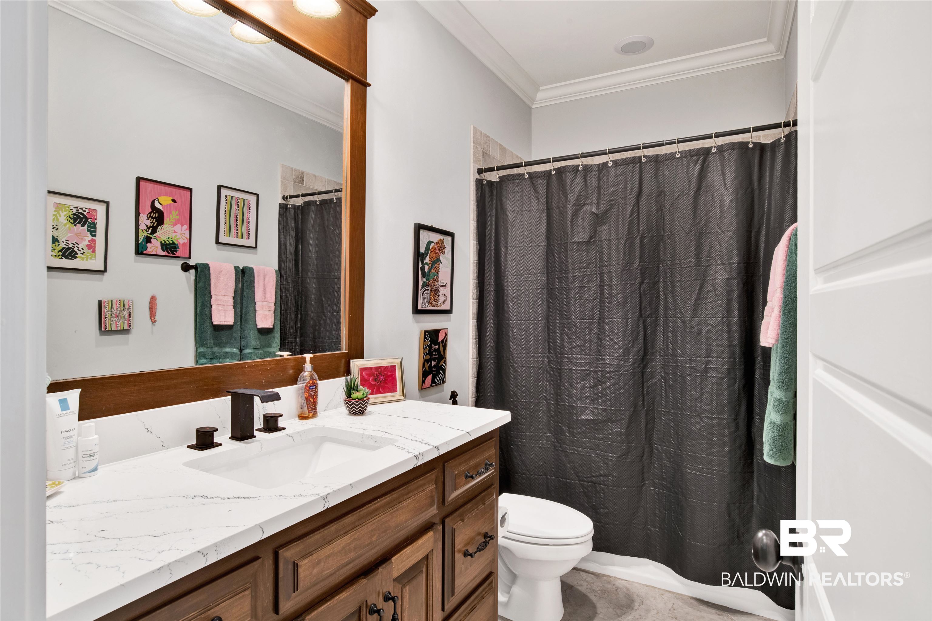 11116 Redfern Road Daphne, AL 36526 - Photo 35 of 46 Full bath featuring vanity, a shower with shower curtain, and crown molding