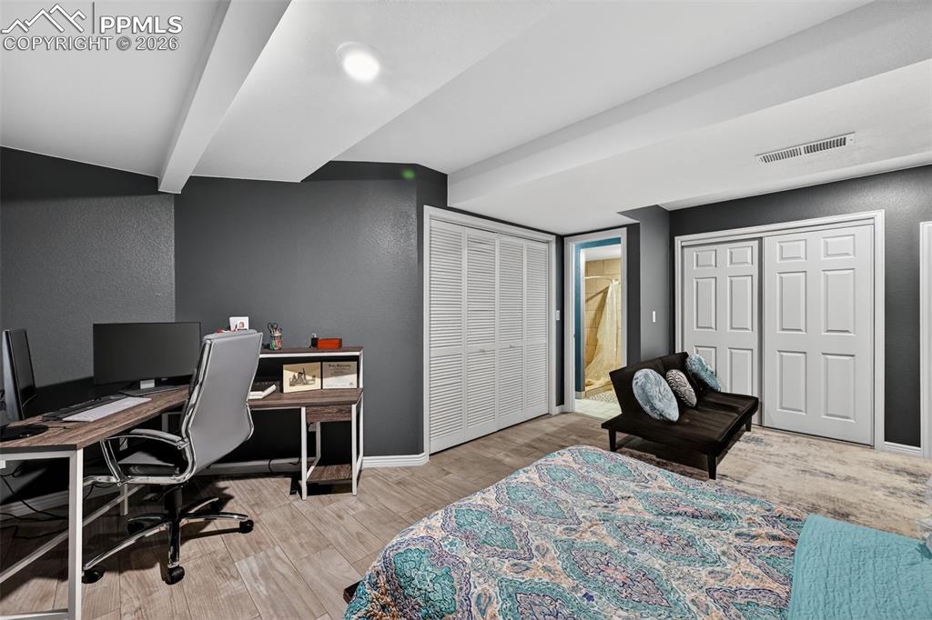 2141 Legacy Ridge View, Unit 109 Colorado Springs, CO 80910 - Photo 18 of 21 a bedroom with a workspace