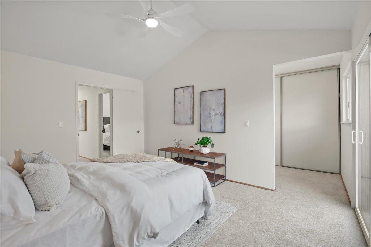663 Smoke Tree Way Sunnyvale, CA 94086 - Photo 17 of 29 a bedroom with a bed and a table