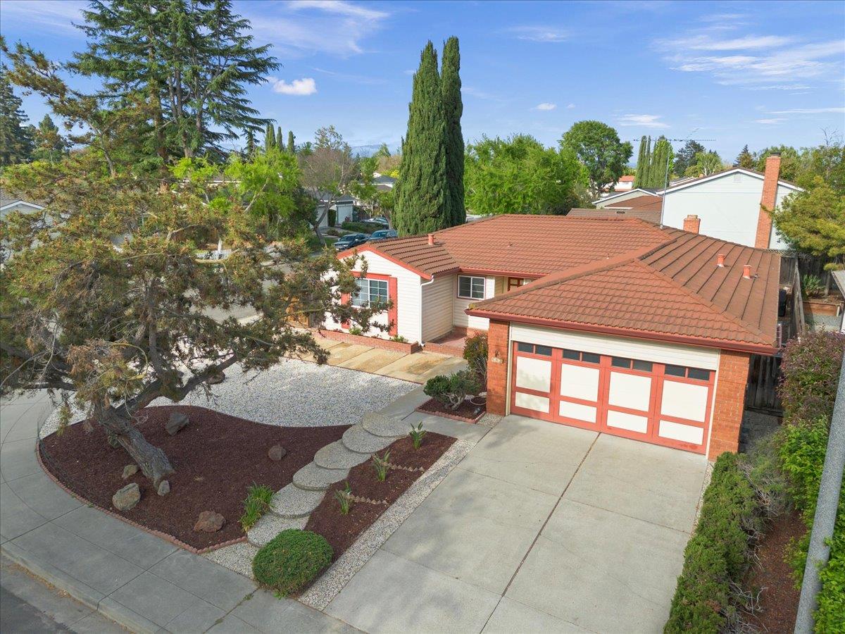 663 Smoke Tree Way Sunnyvale, CA 94086 - Photo 3 of 29 a view of a house with a yard