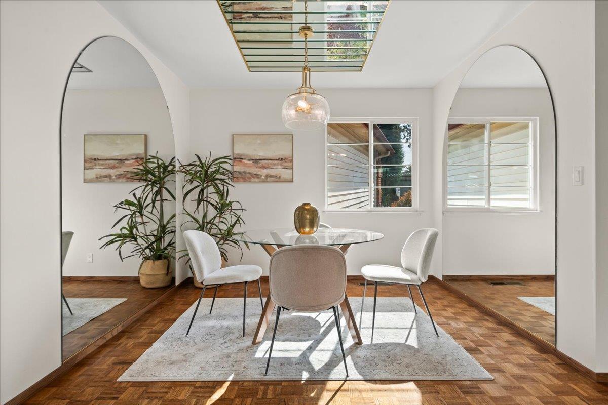 663 Smoke Tree Way Sunnyvale, CA 94086 - Photo 8 of 29 a view of a dining room with furniture window and wooden floor
