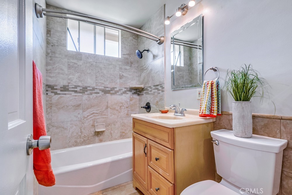 19789 Evelyn Street Corona, CA 92881 - Photo 16 of 22 a bathroom with a sink toilet and shower