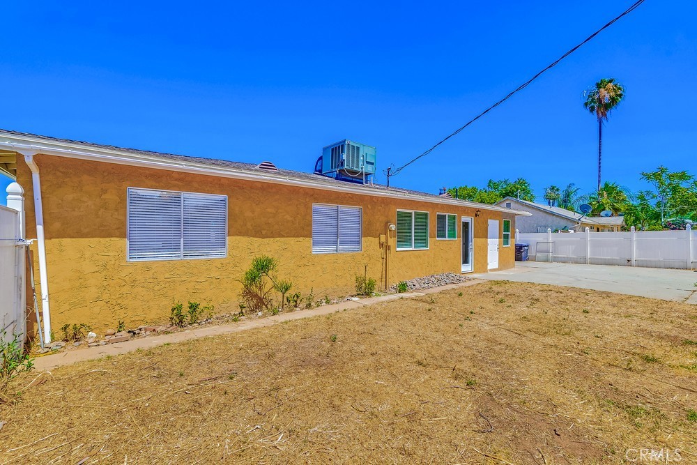 19789 Evelyn Street Corona, CA 92881 - Photo 22 of 22 a front view of a house with a yard
