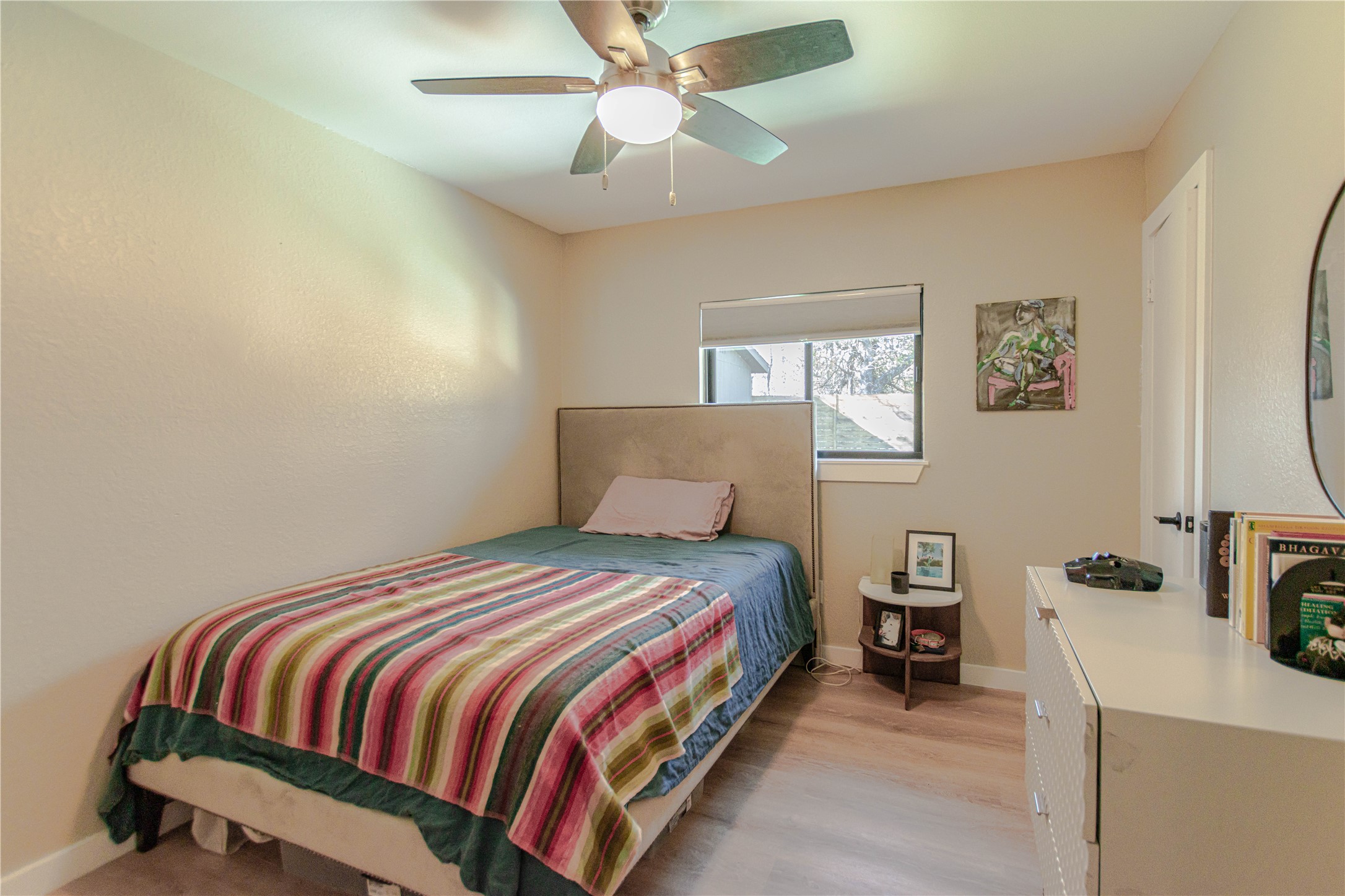 1622 Cattle Trail Austin, TX 78748 - Photo 15 of 22 a bedroom with a bed and window