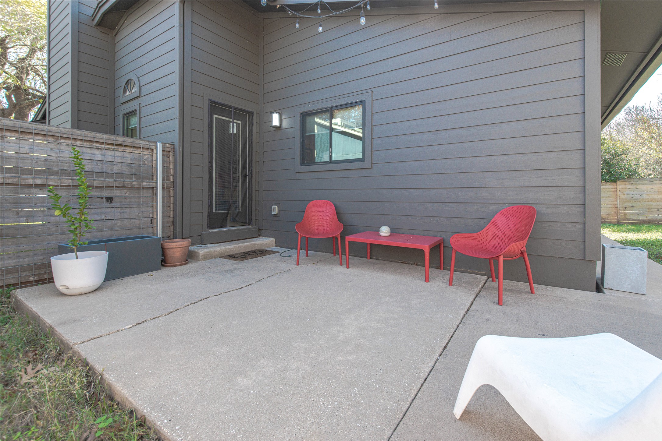 1622 Cattle Trail Austin, TX 78748 - Photo 19 of 22 a backyard of a house with seating space